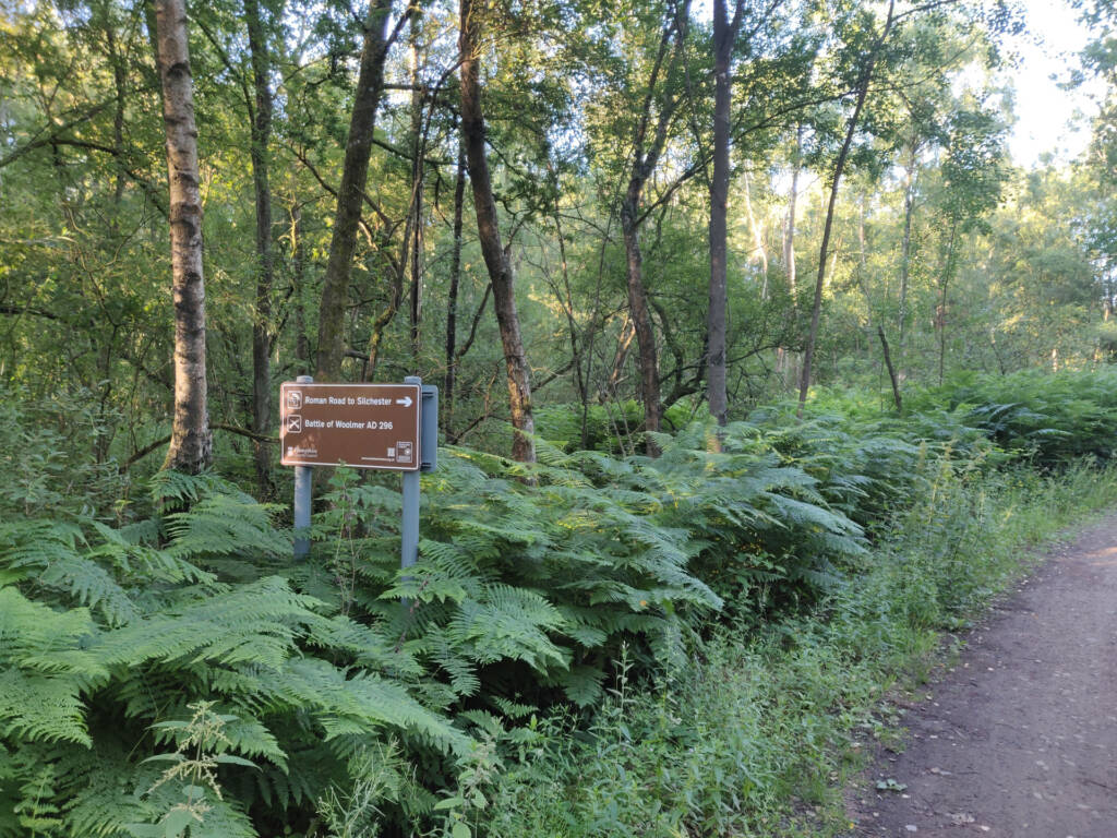 Sign board just off the trail pointing to some historical sites