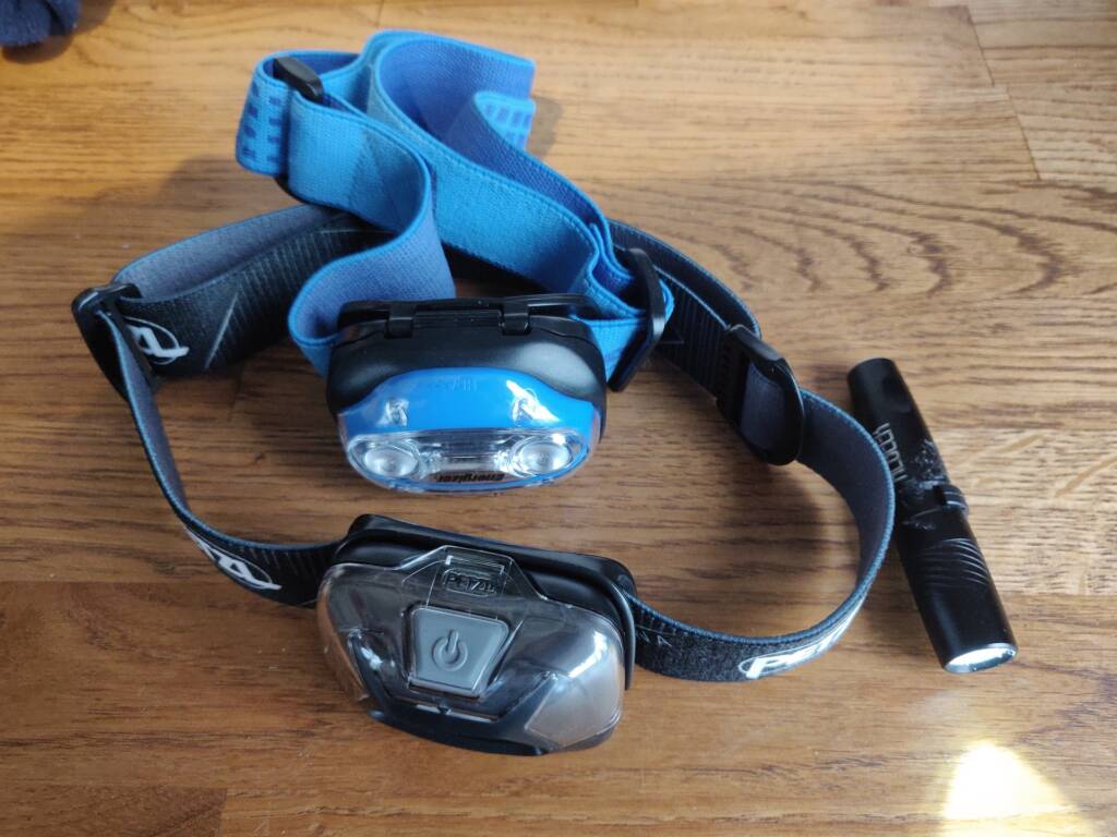 trail running gear for winter - LED headlamps and a directional torch
